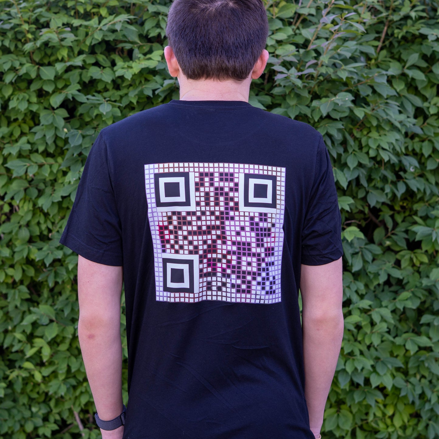 Model wearing the Rick Roll QR Shirt in a casual setting